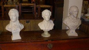 A collection of three composite marble busts including Shakespeare Mozart and Chopin