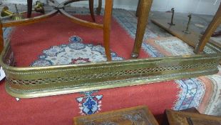 A pierced fire surround. Length: 100cm