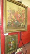 An oil on board still life vase of flowers signed and a still life similar