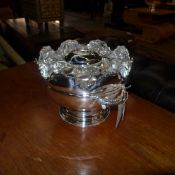 A silver plated caviar set