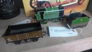 A tinplate Hornby type 101 green painted locomotive, the sides emblazonned with LNER 460; a