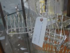 A pair of silver plated toast racks, cricket and golf