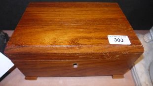 An oak cased Dunhill humidor on four Art Deco style feet