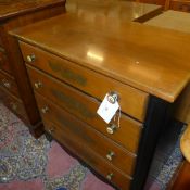 A continental chest having four graduated painted drawers with porcelain handles