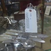 A London silver cream jug with crinkled edge, a silver topped pill pot and silver pepper pot with