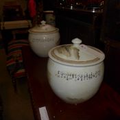 A pair of Chinese style vases with lids