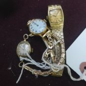 Three ladies wrist watches gold coloured with a silver magnifying glass