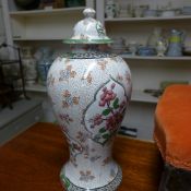 A pair of Leighton pottery vases and covers Hampton pattern