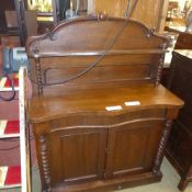 A mahogany serpentine chiffonier with gallery back over panel doors on plinth base
