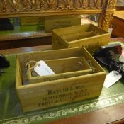 A set of four wooden boxes