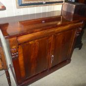 A Victorian flame mahogany chiffonier the cushion frieze drawer above panel doors on plinth base