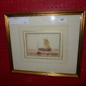 A C19th English school watercolour titled 'Beached Ship' framed and glazed