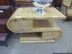 An Art Deco style blondewood S shaped table