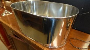 A stainless steel lily Bollinger champagne bath