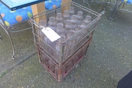 Two crates of milk bottles