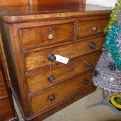 A Victorian mahogany chest having two short above three long drawers (a/f)