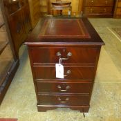 A mahogany pedestal chest the leather inset above drawers