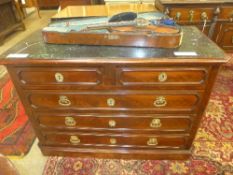 A C19th French flame mahogany commode the green marble top above four drawers with gilt metal