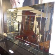A Venetian wall mirror with segmented border