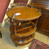 A Victorian style mahogany Canterbury with three divisions and base drawer