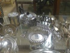 A collection of silver and plate including a fine Mappin and Webb silver canister, a silver basket