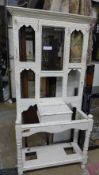 A late Victorian white painted hallstand with mirrored inset