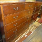 A C19th mahogany tall chest having two short above four long drawers on plinth base