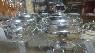 A pair of silver plated tureens