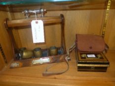 A miscellaneous collection, Tantalus holder, toleware box, napkin rings and others