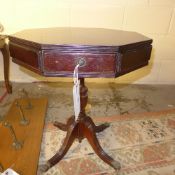 A mahogany octagonal side table with drawer on quadruped base