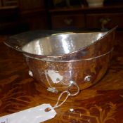 A novelty silver plated ice bucket in the form of a polo helmet