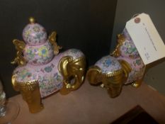 A pair of porcelain gilted Indian elephants