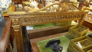 A large gilt overmantel mirror
