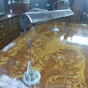 A pair of nickel plated desk lamps
