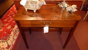 A Georgian mahogany side table fitted single drawer on square tapering supports