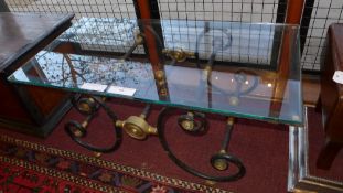 A French butchers style painted iron and brass low table with glass rectangular top