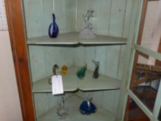 A collection of coloured glass swan form dishes and similar items