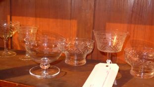 A collection of crystal drinking glasses and similar items