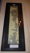 An Oriental ink on paper study in a black frame