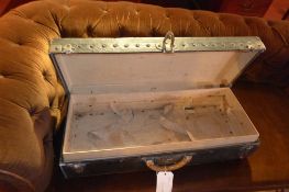 An early C20th Louis Vuitton travel case with studded detail