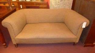 A Victorian Chesterfield sofa upholstered in grey fabric