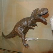A bronze of a Tyrannosaurus Rex