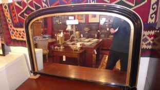 A Victorian ebonised overmantle mirror heightened in gilt banding W 100 cm x H 70 cm