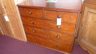 A Victorian mahogany chest fitted two short above three long drawers with knob handles