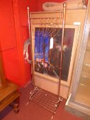 A chromed clothes rail with four hangers