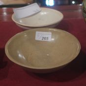 A Chinese beige glazed Song dish and a similar [2]