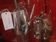A silver plated four piece tea set with engraved detail and a silver plated coaster