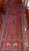 A fine North West Persian Lillihan runner 380 cm x 75 cm repeating petal floral motifs on a