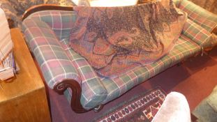 A Regency rosewood double scroll end settee with carved detail and upholstered in tartan fabric