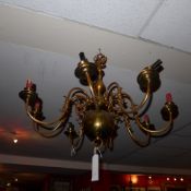 A C19th brass eight branch chandelier